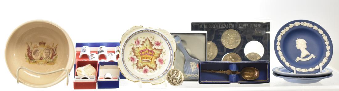 Queen Elizabeth Collectible Grouping: Including a coronation bowl dated 1953, a silver jubilee coin set, thimbles in original boxes, a silver jubilee pin, four pieces of Wedgewood and related items.