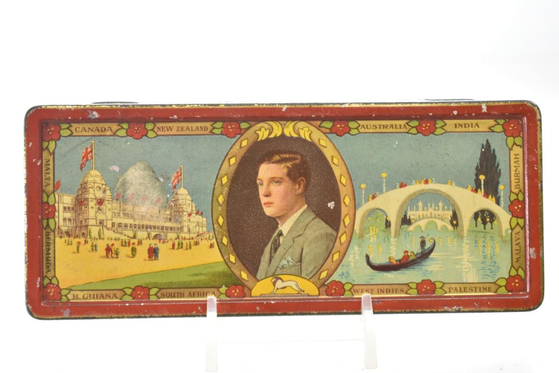 Edward VIII Litho Chocolate Tin: Item measures approx. 2 1/2"h x 6"w. The lithography is good with minor scuffs. The tin is sound and the back reads "Souvenir of the British Empire Exhibition Wembley London 1924 Rowntree & Co. York, 