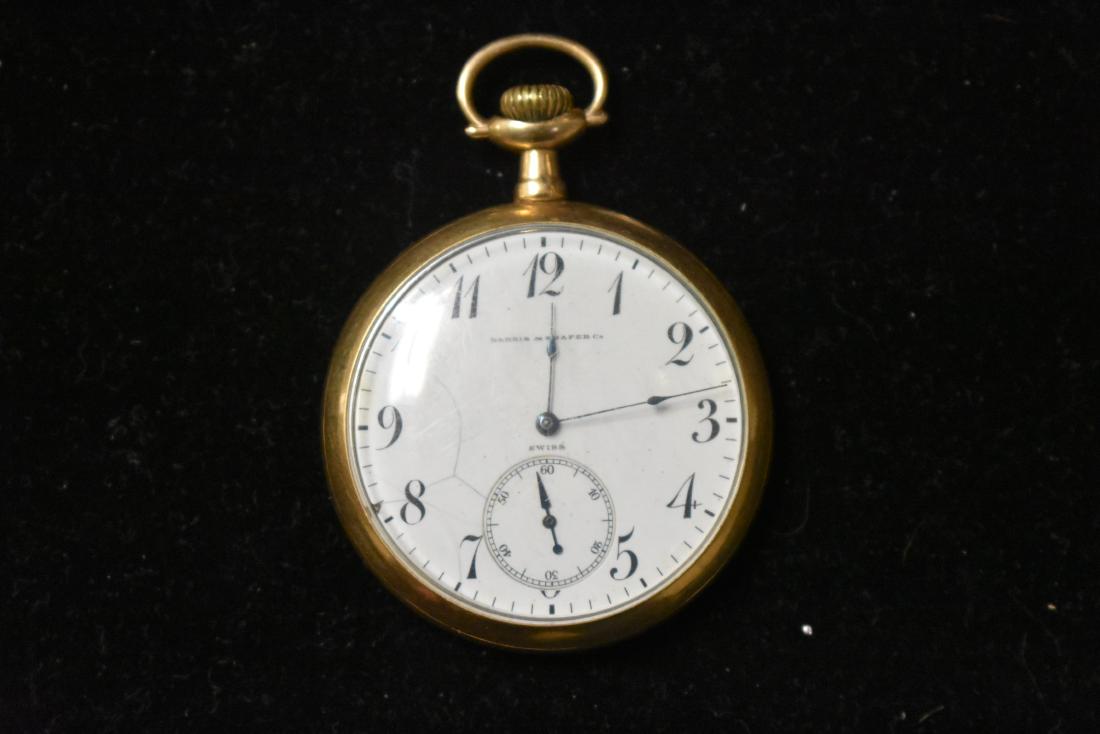 Harris and Shafer Pocket Watch: Item is a 17 jewel pocket watch with a Longines Swiss movement. Watch is monogrammed on the back.