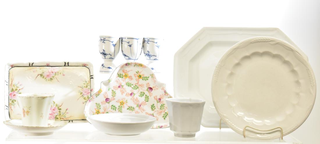 Mixed China and Ironstone: Lot includes three German egg cups, two hand painted Japanese trays, a mustache cup and three pieces of white ironstone.