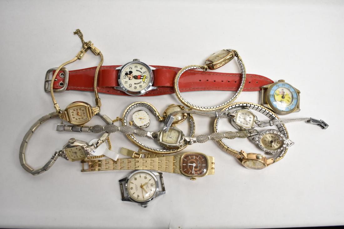 Group of Lady's Watches: Including Bulova, Waltham. a Croton marked "Swiss", a Helbros 17 jewel, a Barbie marked "Swiss Made" and others. Total of twelve watches and a movement.