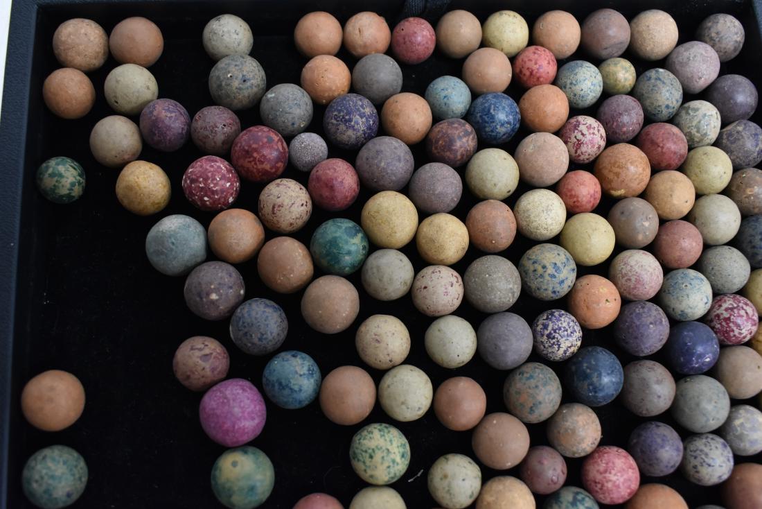Collection of Clay Marbles: Approx. one hundred clay marbles of various colors and sizes.