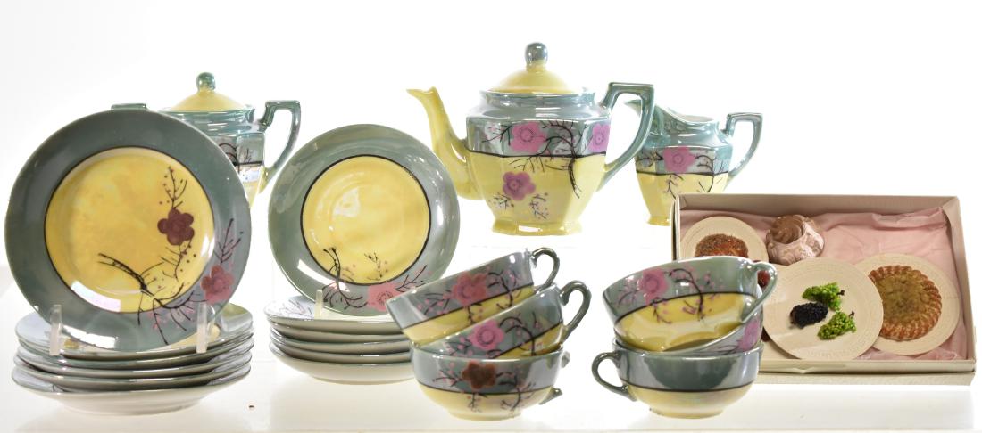 Little Hostess Japanese Tea Set in a Box: Hand painted child's tea setwith six cups and saucers, six underplates, a creamer, a sugar and a teapot in original box.