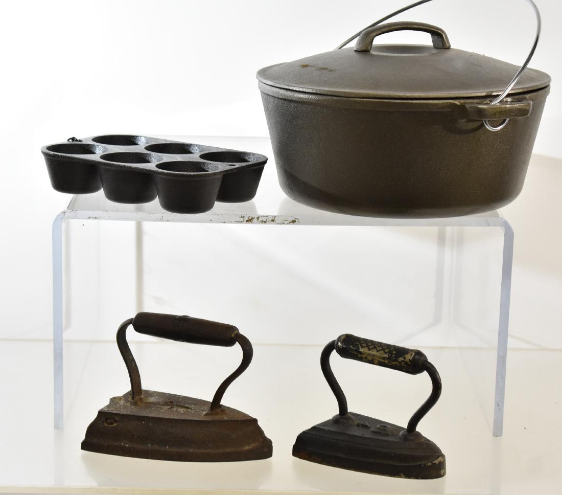 Grouping of Cast Iron Kitchen Ware: Including a contemporary John Wright Dutch Oven, a contemporary Lodge muffin tin and two vintage sad irons,