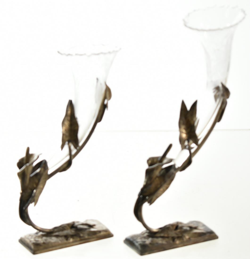 Pair of Silver Plated Calla Lily Epergnes: Each measure approx. 9 1/"h. They have silver plated bodies, etched glass inserts and both inserts have chips.