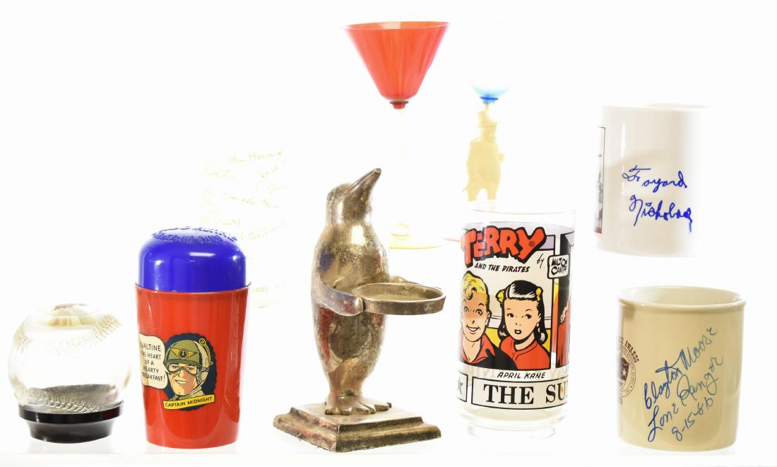 Mixed Collectibles - Some with Autographs: Including a coffee mug signed "Tayard Nicolas", a coffee mug signed "Clayton Moore Lone Ranger 8/15/86", an Ovaltine Captain Midnight shaker, a Carstairs Figural penguin tip tray, a glass baseball ban