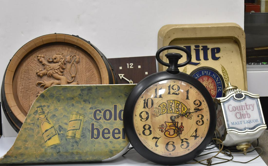 Beer and Liquor Advertising: Including a National Bo clock, a VO light, a Miller Light sign and others. Seven total pieces.