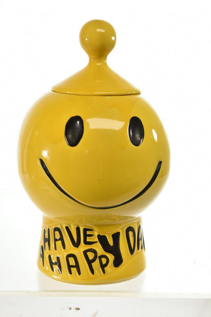 McCoy "Happy Day" Cookie Jar: Measures approx. 11"h. It is a "Have a Happy Day" smiley day cookie jar, has no visible flaws and has McCoy mark on bottom.