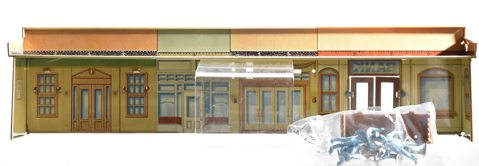 Tin Litho City Scape with Plastic Figures: City Scape representing the 1920s is approx 20" long and 5" high. Characters are approx 2 1/2" tall.