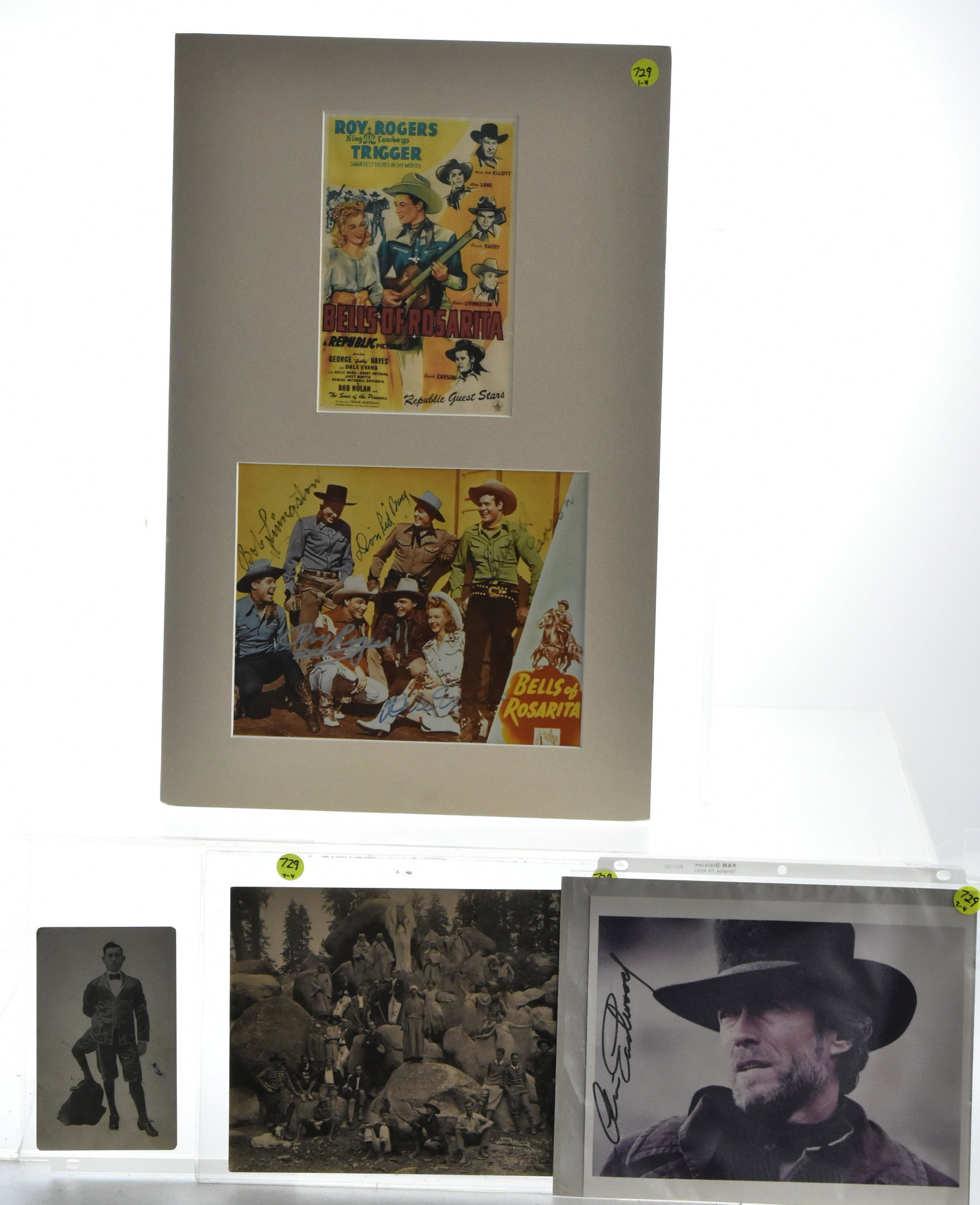 Autographed Movie Stills: including Clint Eastwood, the Bells of Rosarita signed by Bob Livingston, Roy Rogers and others, an original cast photo from the music drama "The March of Man" produced in the Amphitheater of the Star