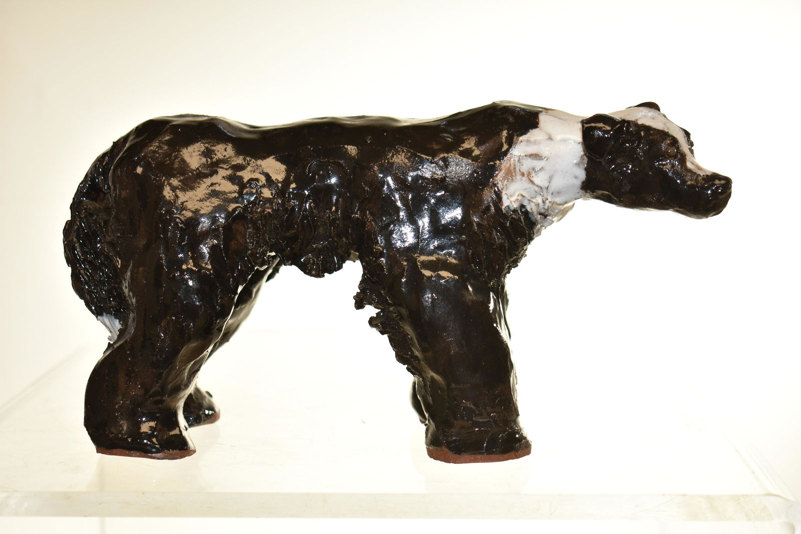 Early Redware Glazed Dog Figure: Measures Approx. 5in high and 9 in long.