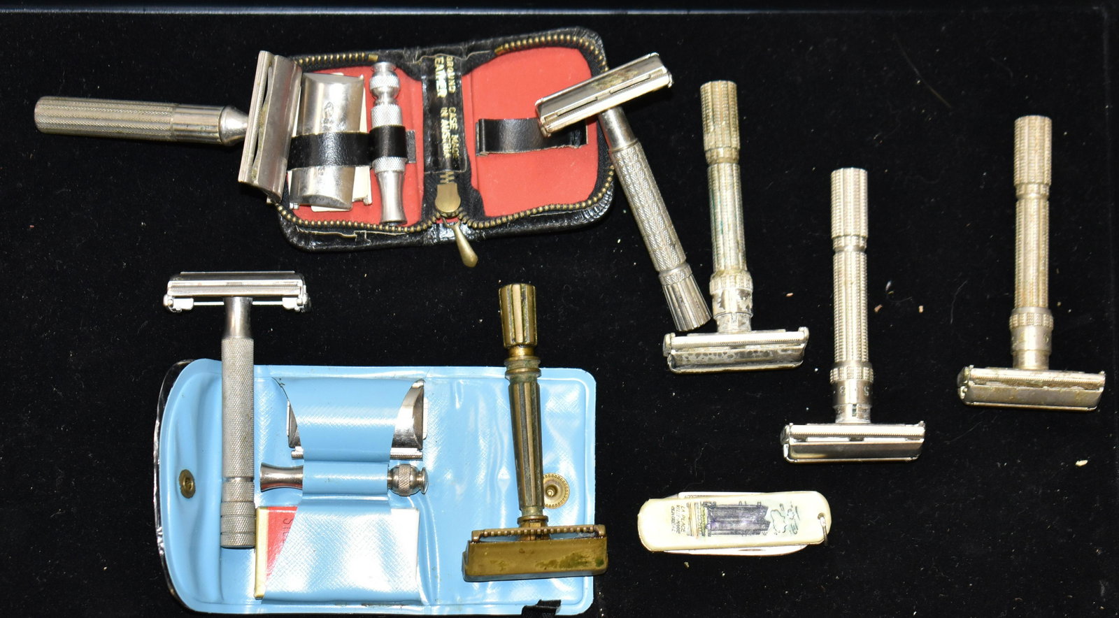 Grouping of Vintage Razors: Lot includes nine razors, two in cases and an advertising pocket knife.