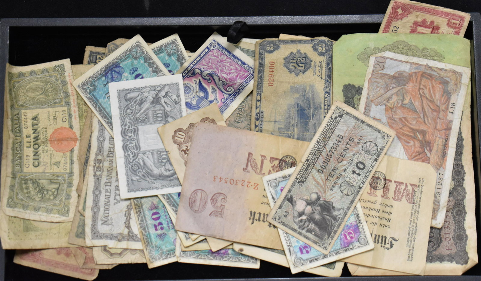 Vintage International Currency: Including 1922 -50,000 Mark note, Vintage Francs, Ten cent Military payment note and many others.