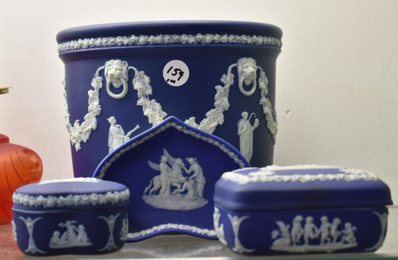 Grouping of Wedgwood: Including a wine bucket, two covered boxes and a tray with roses around trim