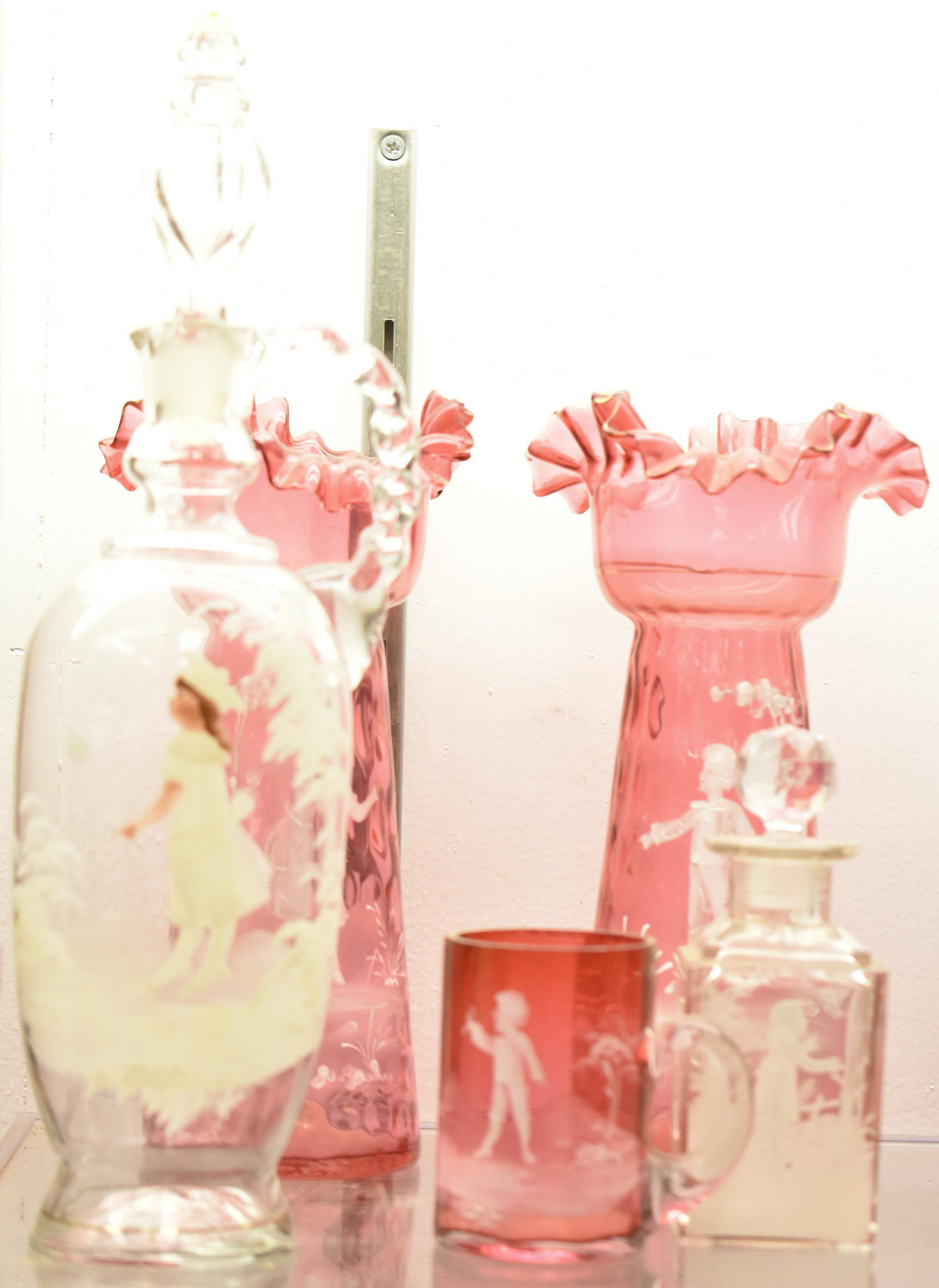 Five Piece Mary Gregory Glassware Collection: Largest measures approx. 12" high