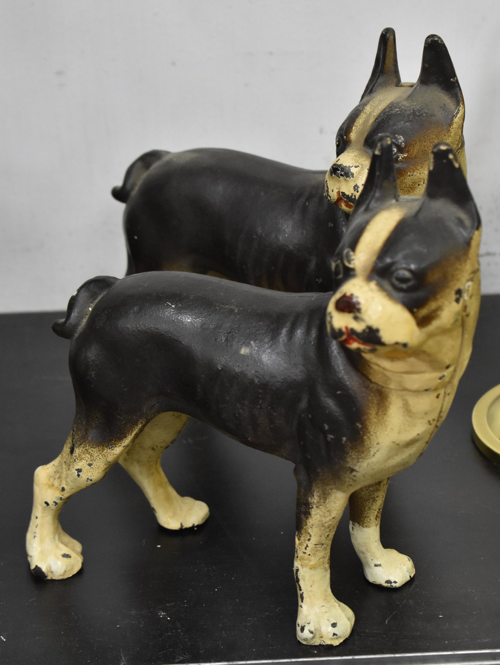 Two Boston Terrier Door Stops: Each measures approx. 9"h. They are two piece door stops with straight head screws and open bottoms.