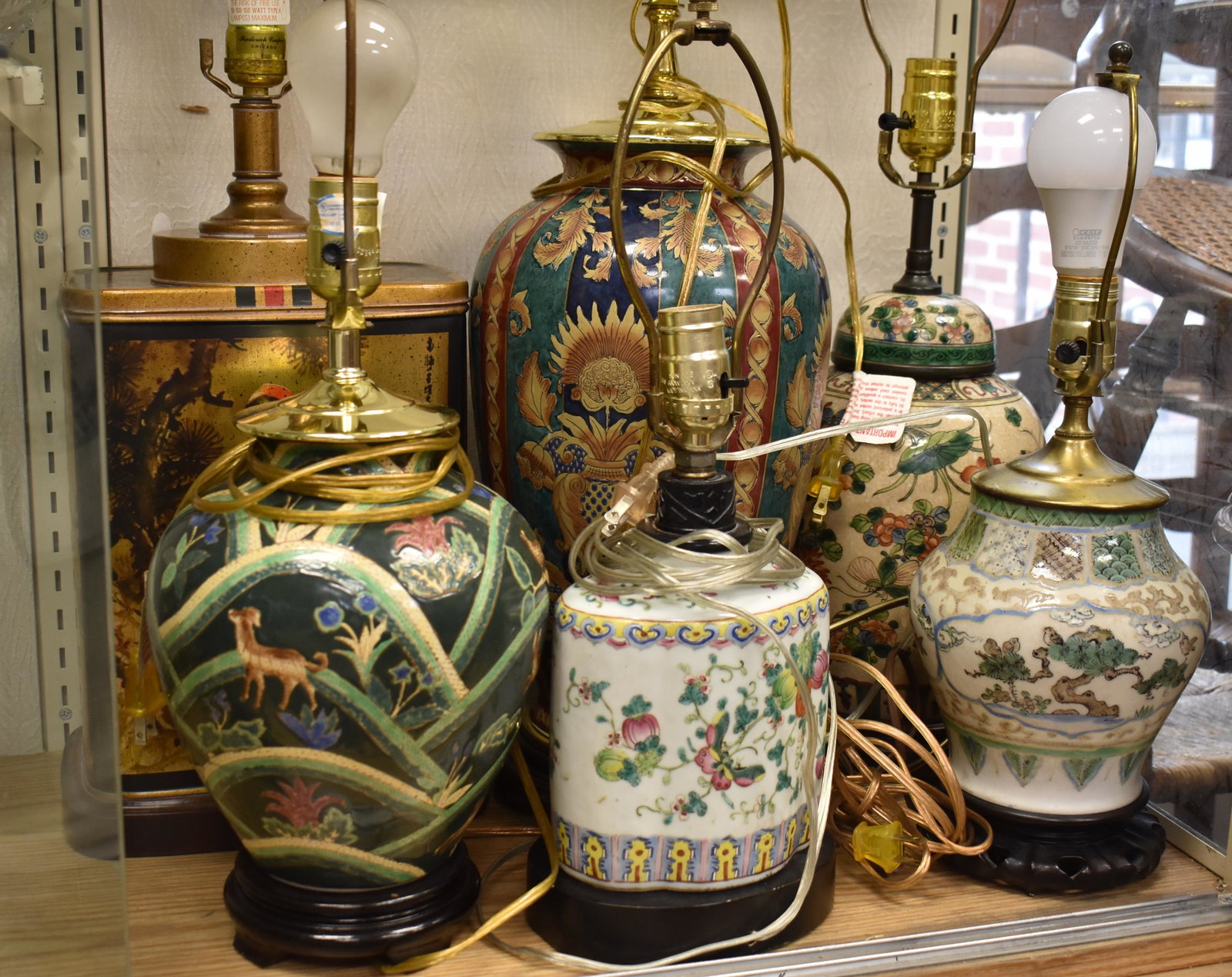 Group of Asian Lighting: Six decorative Asian table lamps