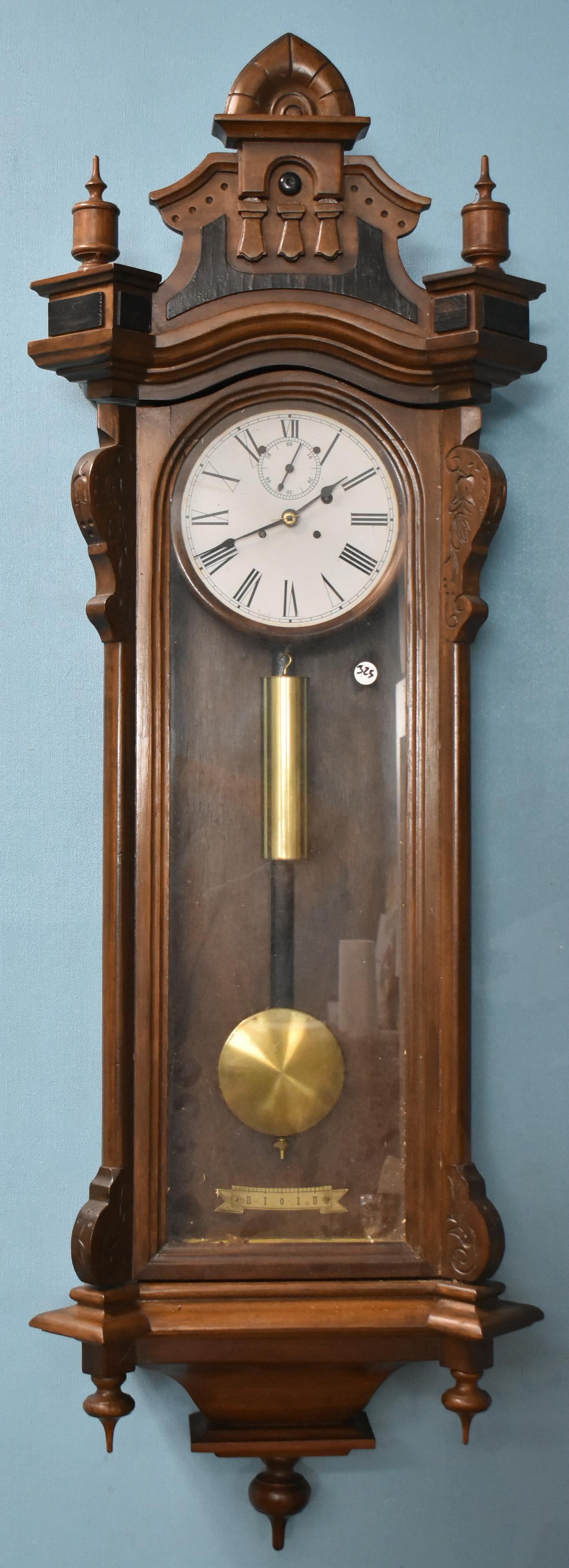 Seth Thomas Wall Regulator No. 5.: Seth Thomas Wall Regulator No. 5 Clock Has a 7.5 in diameter white metal dial with black Roman hour numerals, black spade hands, sub seconds dial and wood bezel; weight driven 8 day movement; and reta