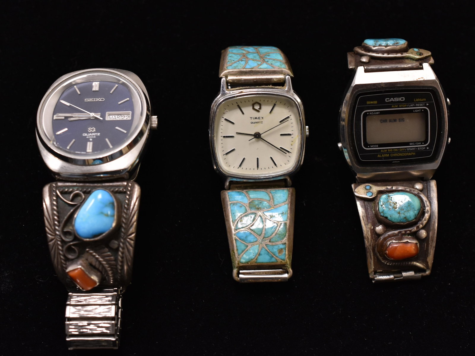(3) Native American Sterling Watch & Bands: Including three. Two bands have large turquoise and coral stones; one having a snake design, and the other is inlaid turquoise. One watch Seiko.