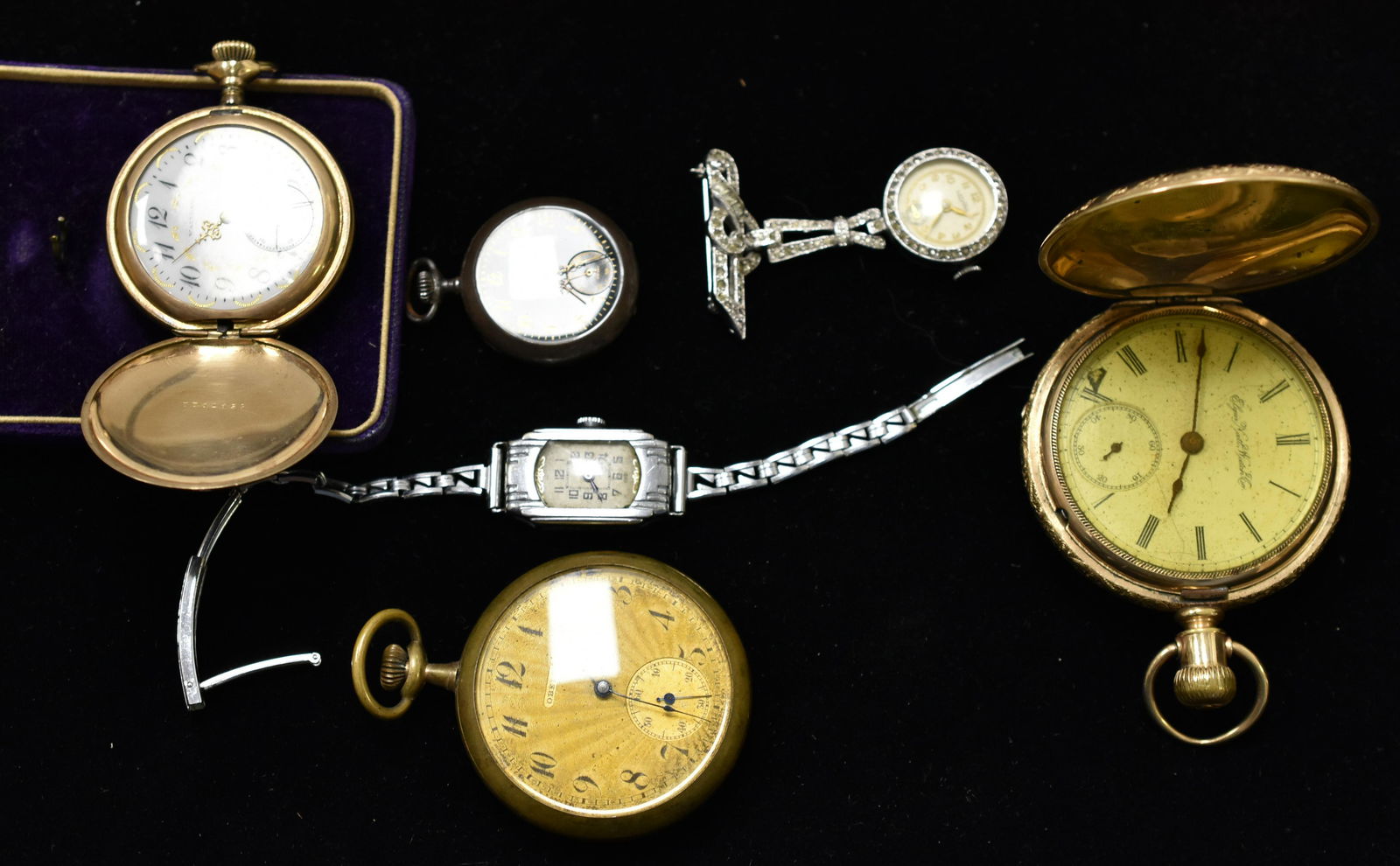 Vintage Pocket Watch & Watch Grouping: Including a large Elgin gold fill pocket watch. (Note: some wear damage to face), a Waltham ladies pocket watch with gold hands and numerals, Obelisk Switzerland pocket watch, and more.