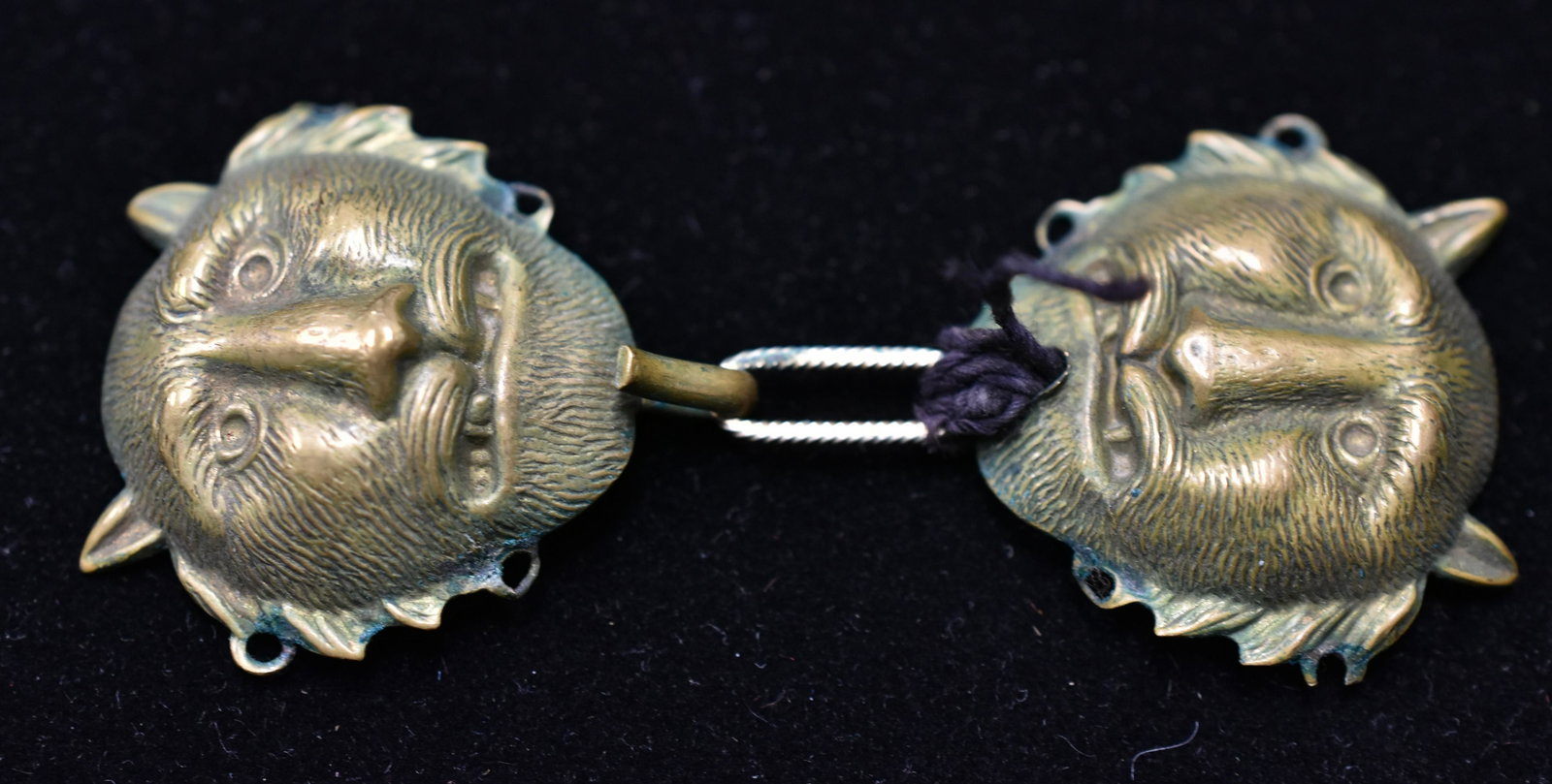 17th-18th C. Chinese Buckle Hook Closure: Closure is am early tiger head form made of brass with intricate detail.