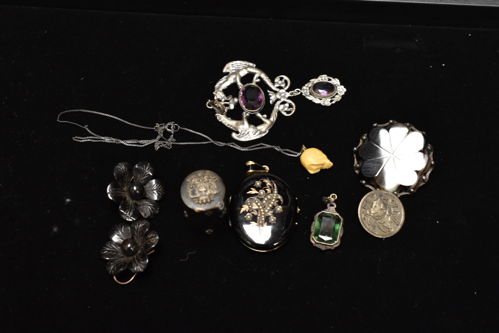 Victorian Jewelry Collection: including black enamel seed pearl mourning locket, .800 silver large amethyst and gargoyle pendant, English silver banded agate pin, carved floral shell mourning earrings with gold wires, early carved