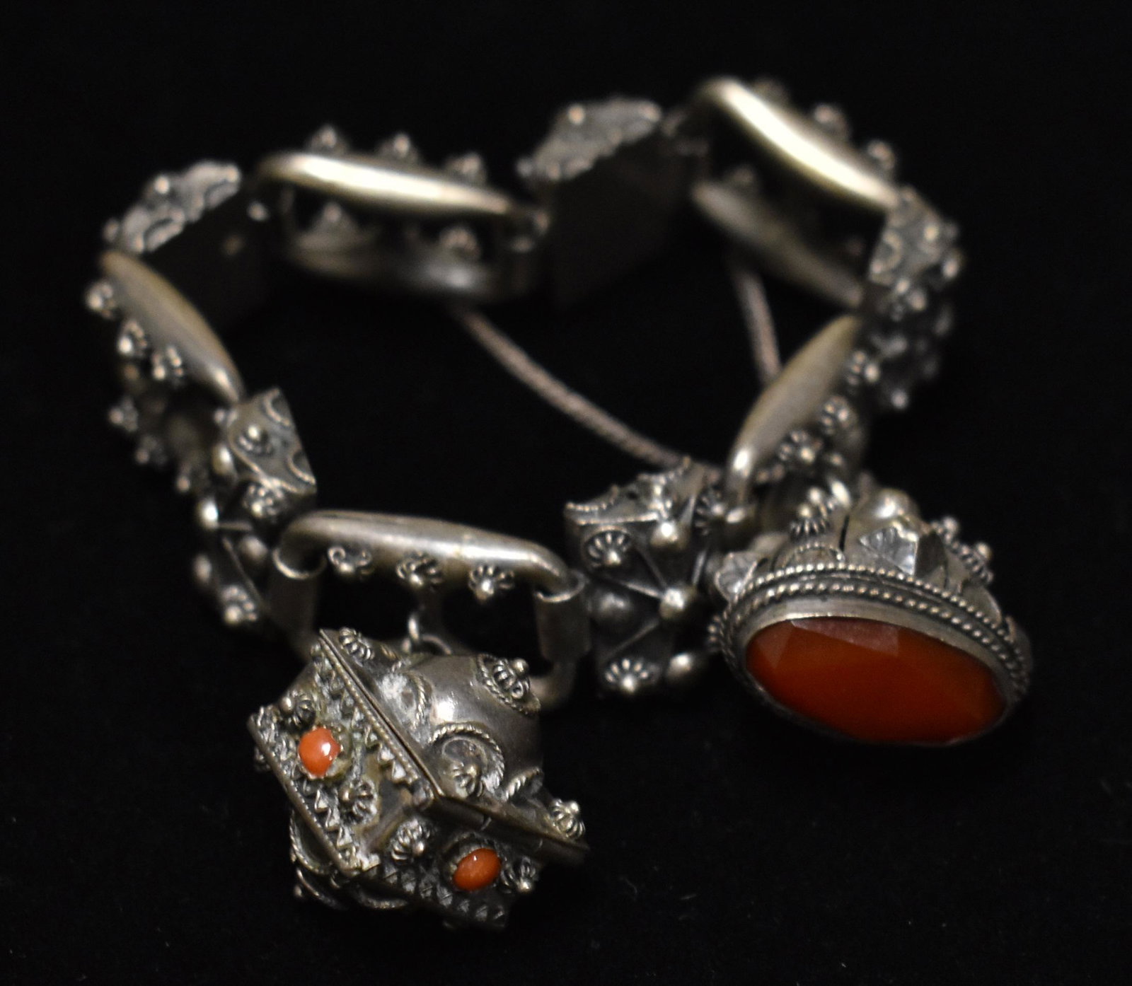 Square Link Etruscan .800 silver Charm Bracelet: includes two large charms with coral and carnelian.