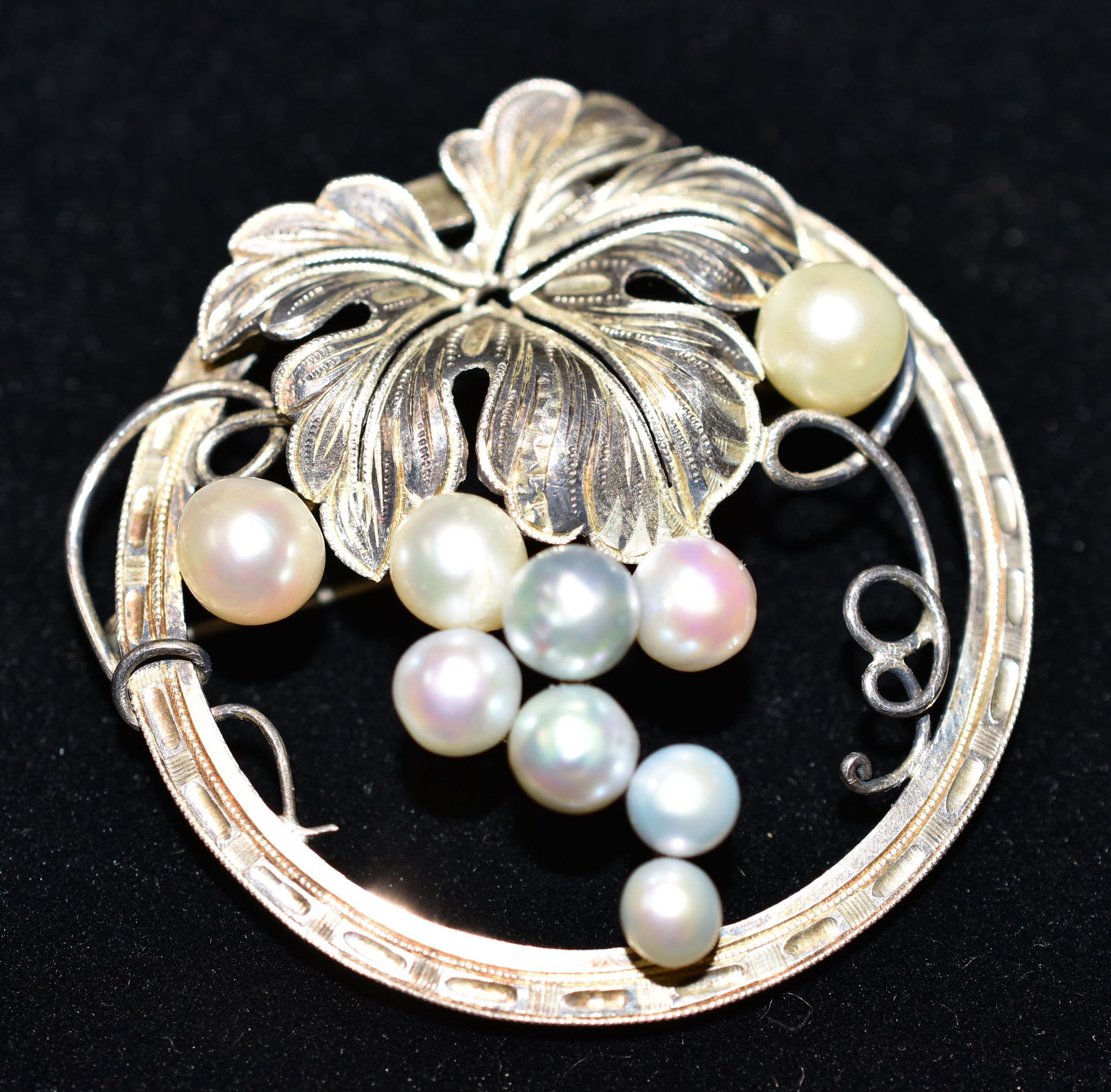 Mikimoto Sterling Japan Cluster Pin: Pin is round with grape cluster of blue, white, and pink blue pearls.