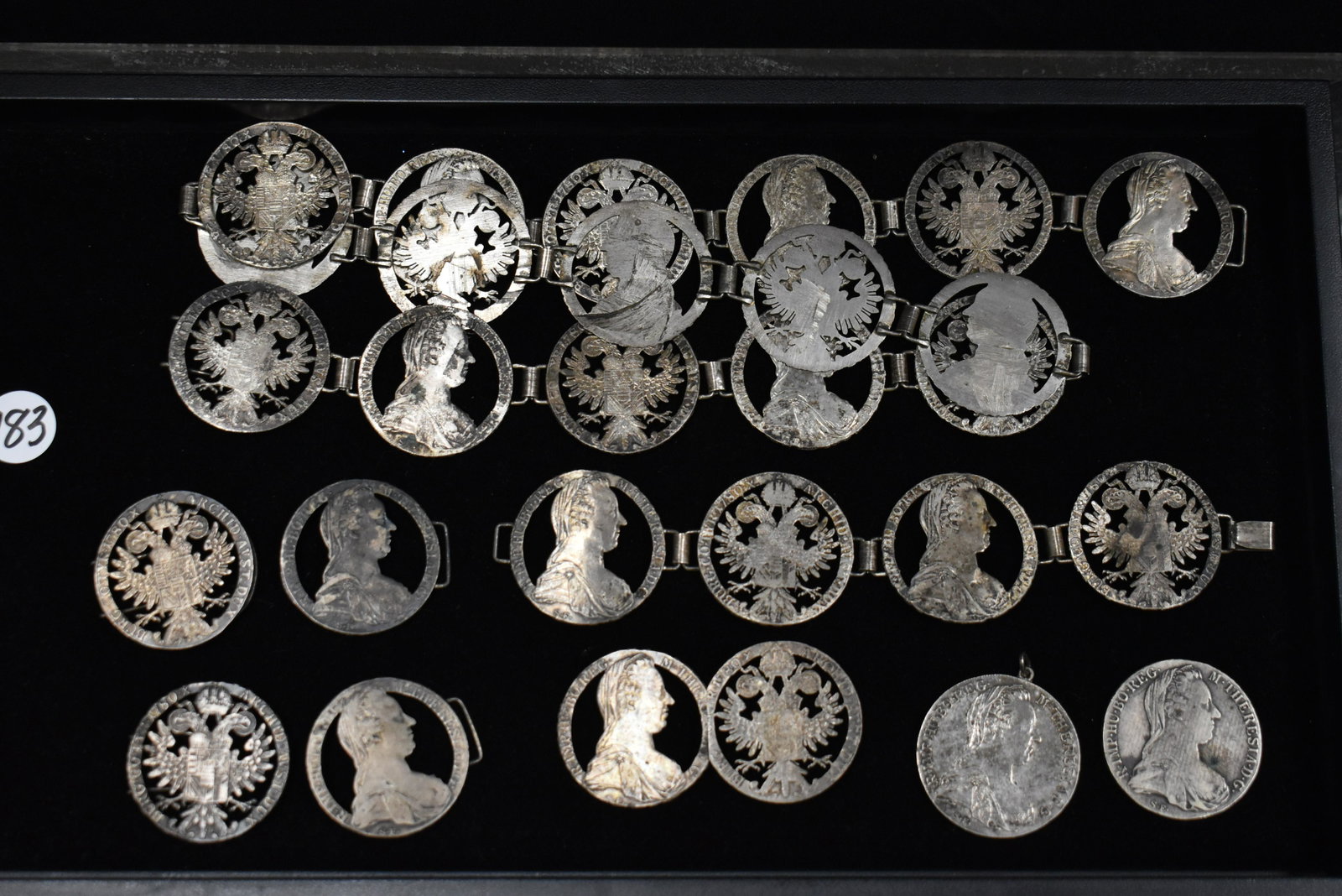 Antique Asian Silver Coin Belt: The belt is 1780 Austria Maria Theresa Silver Thaler Coin carved with several extra pieces and a buckle.