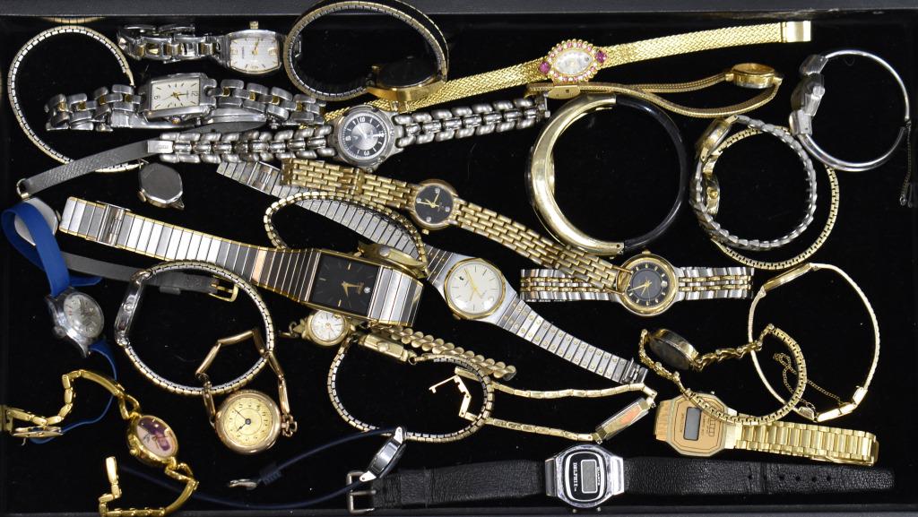 Grouping of Ladies Watches: LA Express Watches, a Fossil with black face, Elvis watch, Seiko watch, and others.