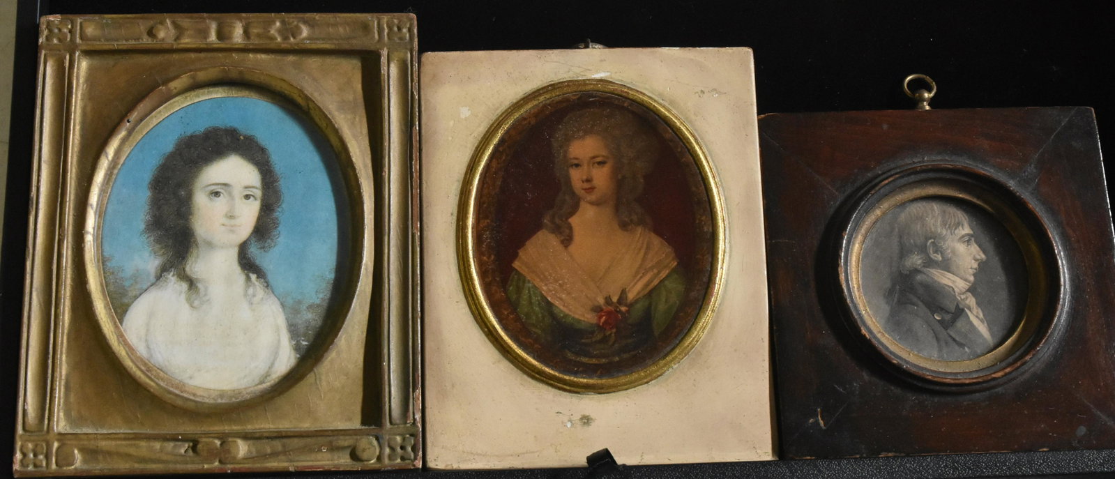 Three 19th Century Miniature Portraits: Largest measures approx. 5 1/2"h. It depicts a girl on a blue background and is in a gesso over wood frame. Second depicts a lady with a rose and is on a tile frame with tag reading "Borghese". Third 