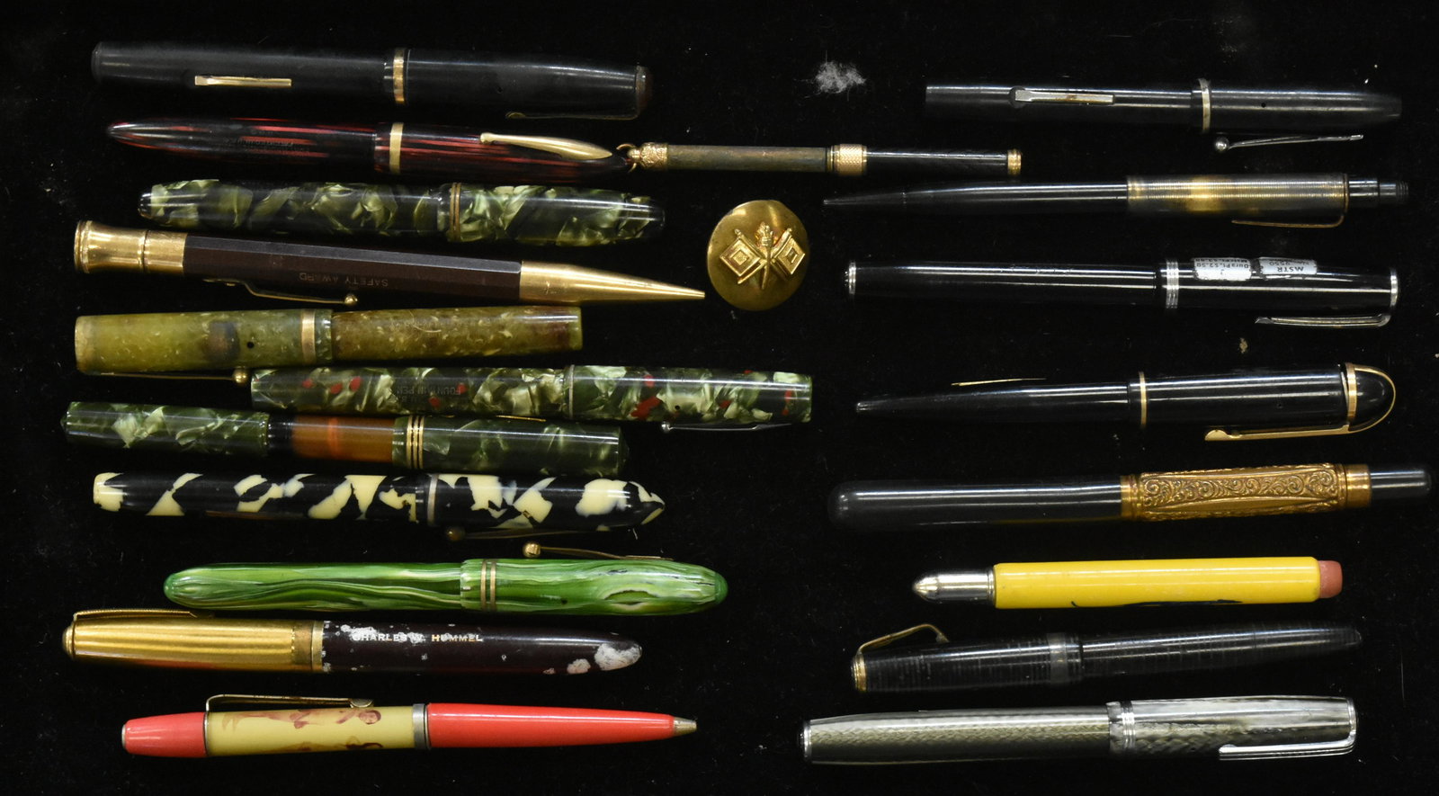 Collection of Vintage Pens: Various mottled celluloid pens, a black celluloid and brass pen with a 14K nib, a floater nudie pen and other quality pens. Twenty total pieces.
