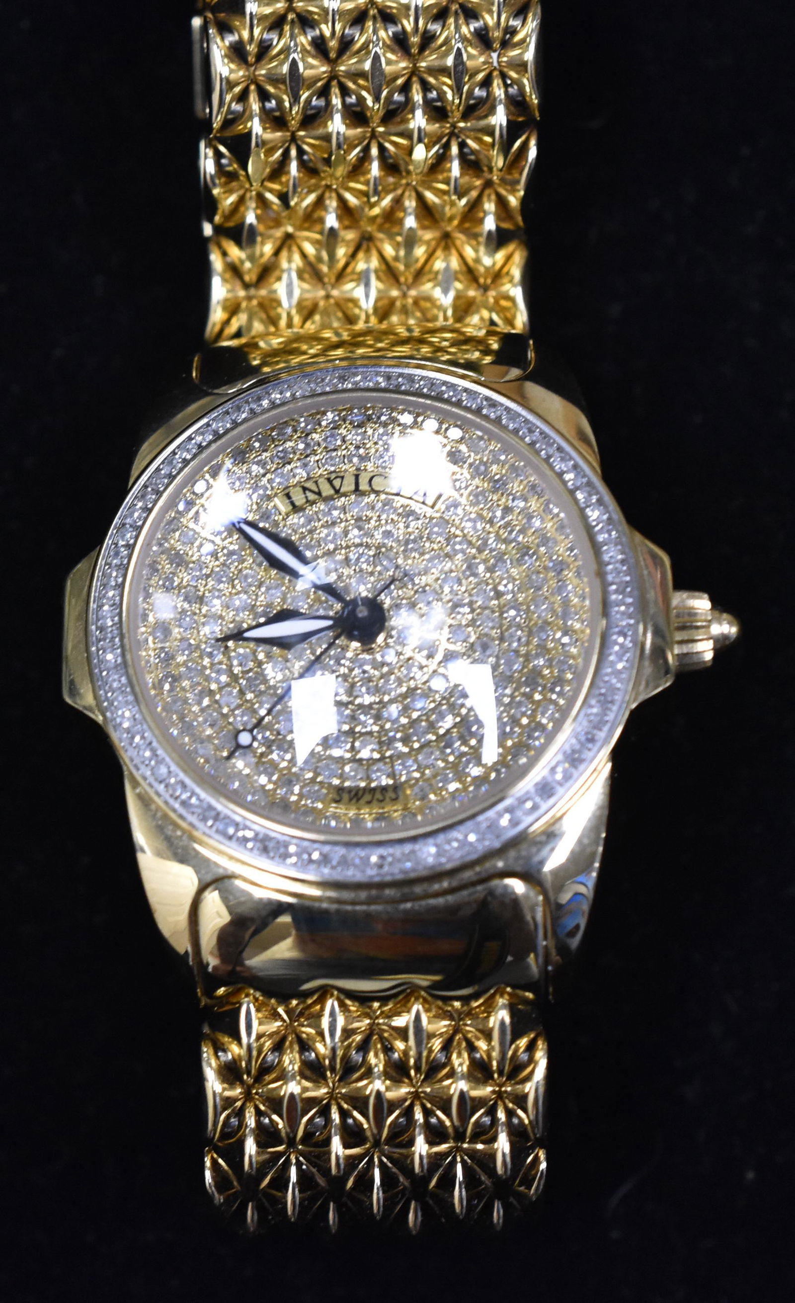 Invicta Swiss Diamond Limited Edition Watch: Pave diamond face and bezel sapphire #938/1200. Water resistant to 10 ATM. Model 2973.