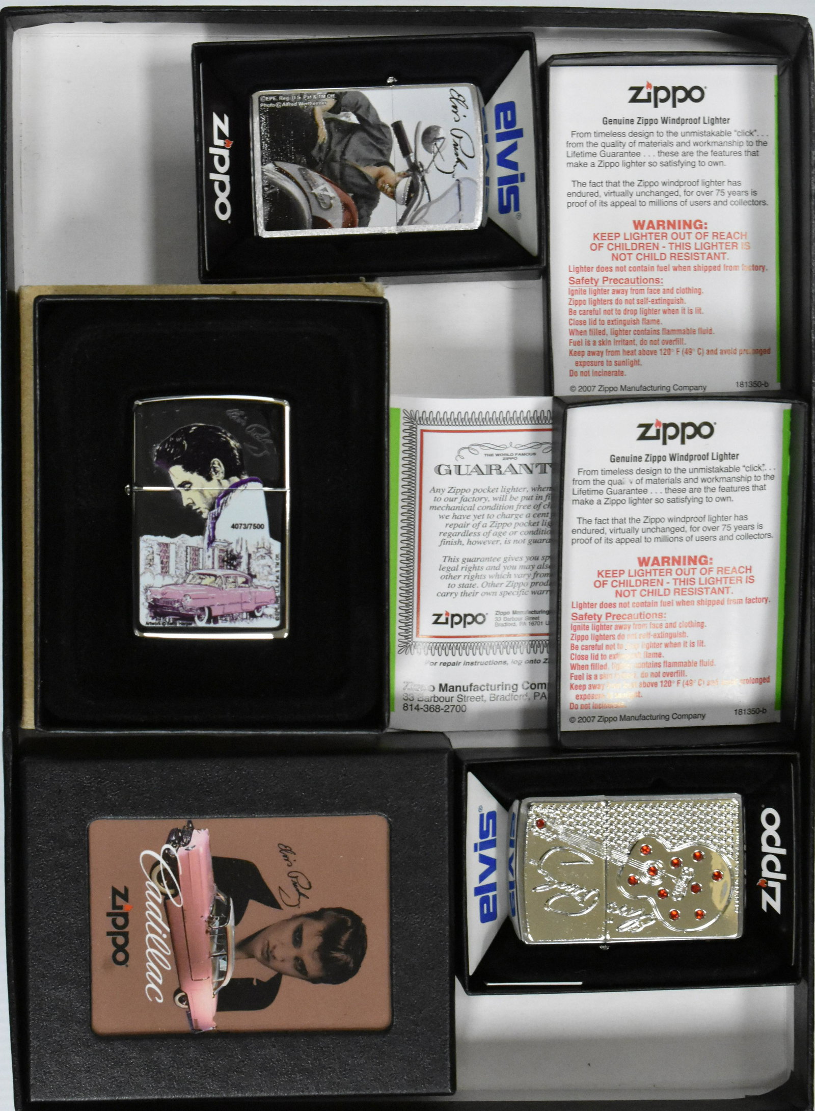 Elvis Zippos (3): Three Elvis Zippo lighters; one with him and pink Cadillac, one with Harley Davidson, and guitar with signature.