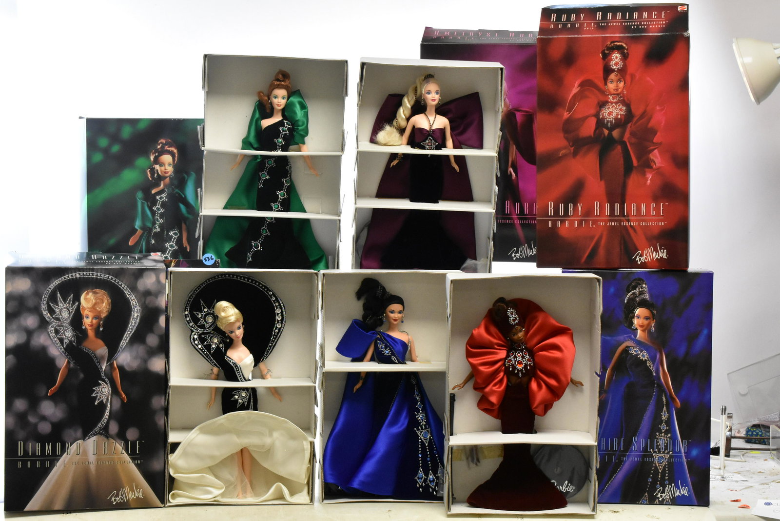 5 Bob Mackie Barbies: Includes Design Porfolio for each Barbie Ruby Radiance #15520, Sapphire Splendor #15523, Diamond Dazzle #15519, Amethyst Aura #15522, and Emerald Embers #15521. All NIB