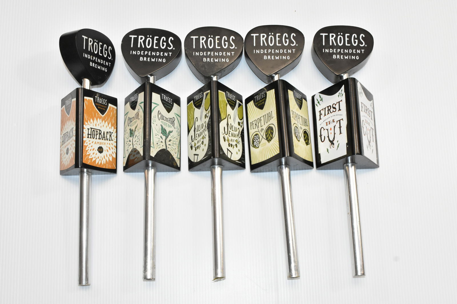 Grouping of "Troegs" Beer Taps: Five various Troegs beer taps.