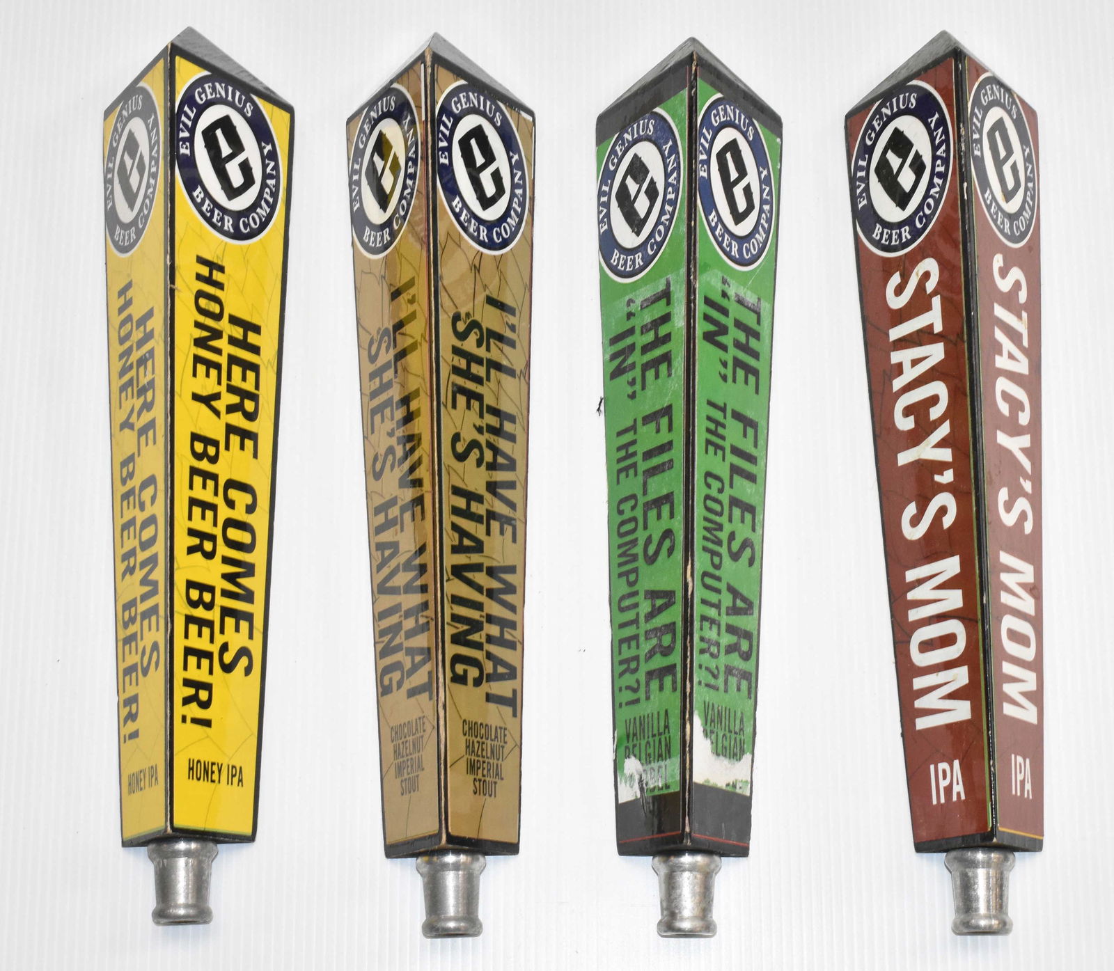 "Evil Genius" Beer Company Beer Taps: Four various Evil Genius beer taps.