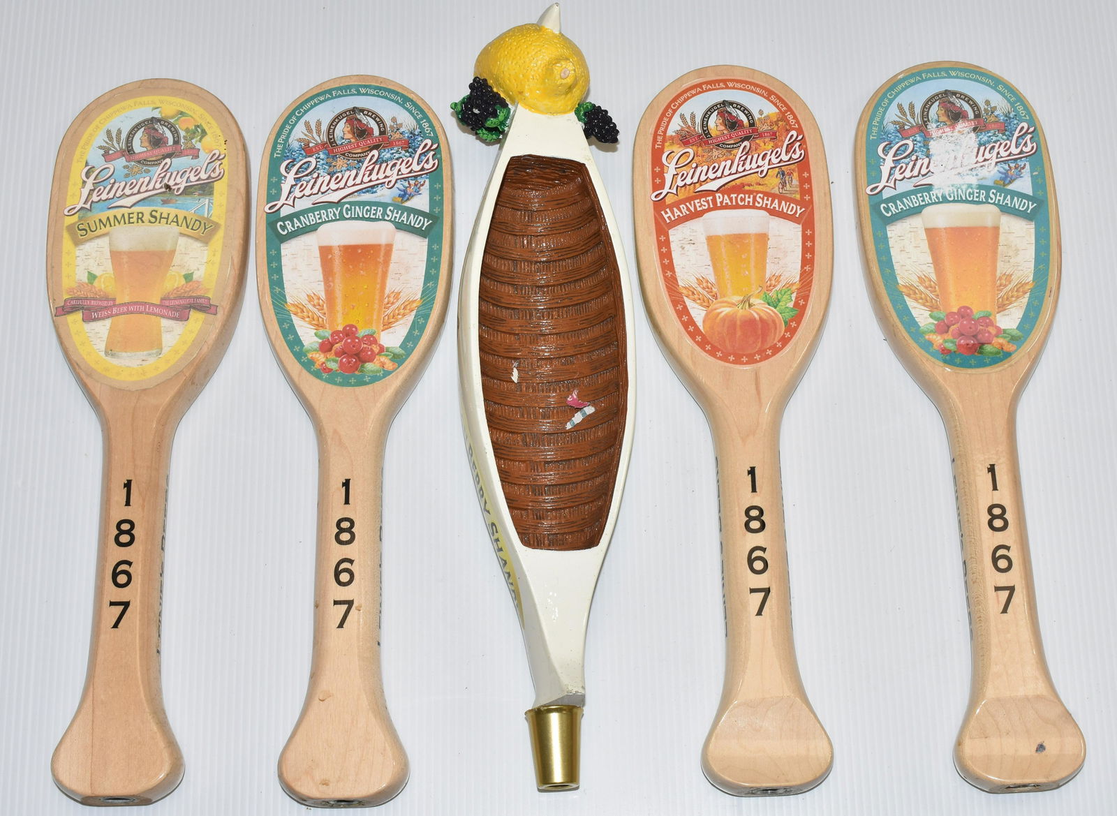 "Leinenkugel's Brewery" Beer Taps: Five beer taps including a canoe.