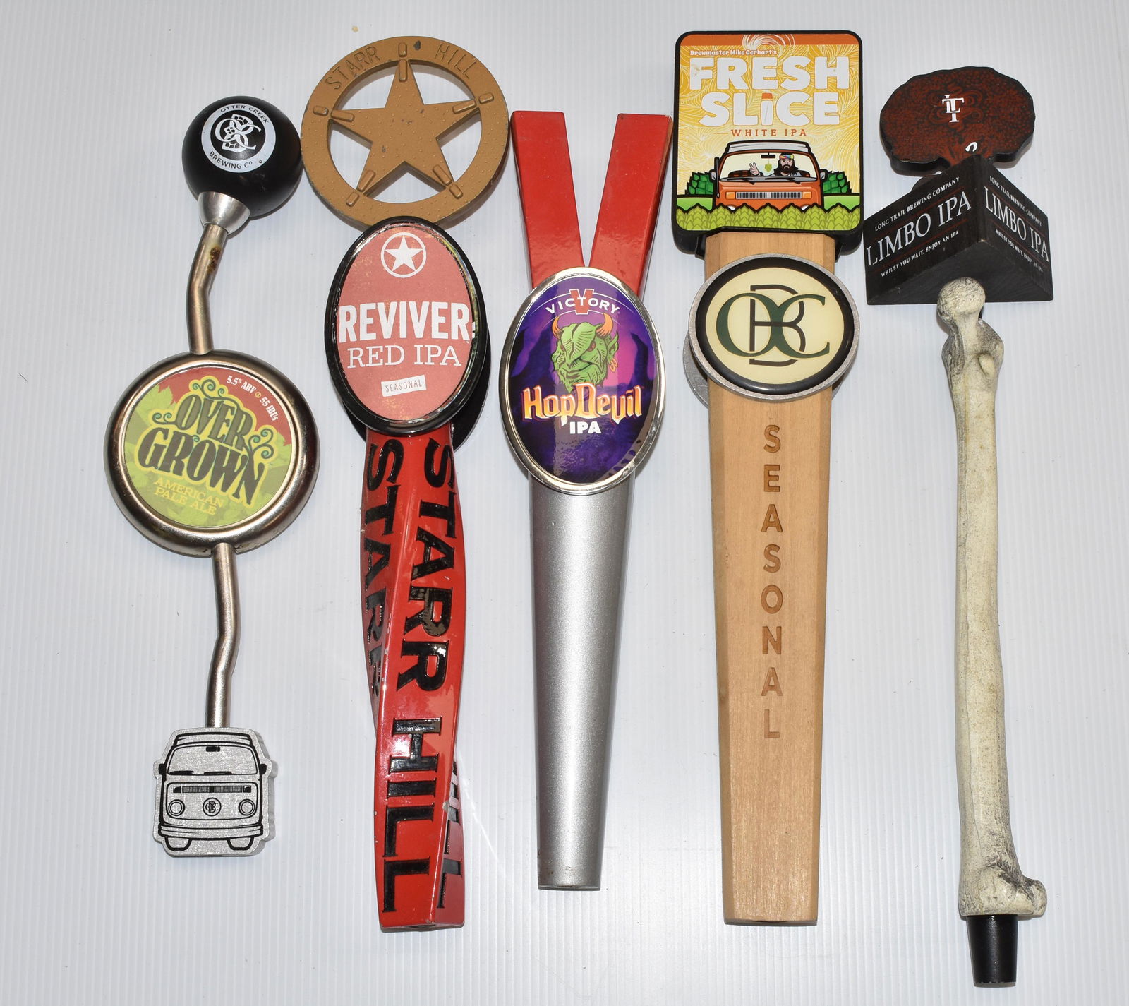 Five Mixed Beer Taps: Including "Victory", "Limbo", "Otter Creek" and others.