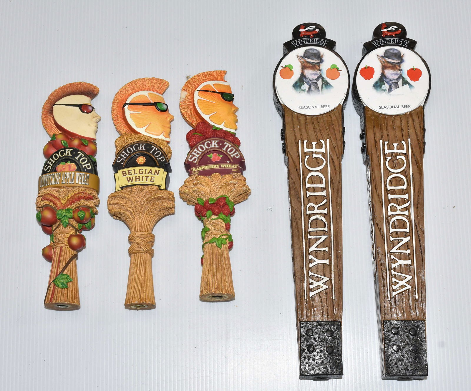 Shock Top and Wyndridge Beer Taps: Three Shock Top and two Wyndridge beer taps.