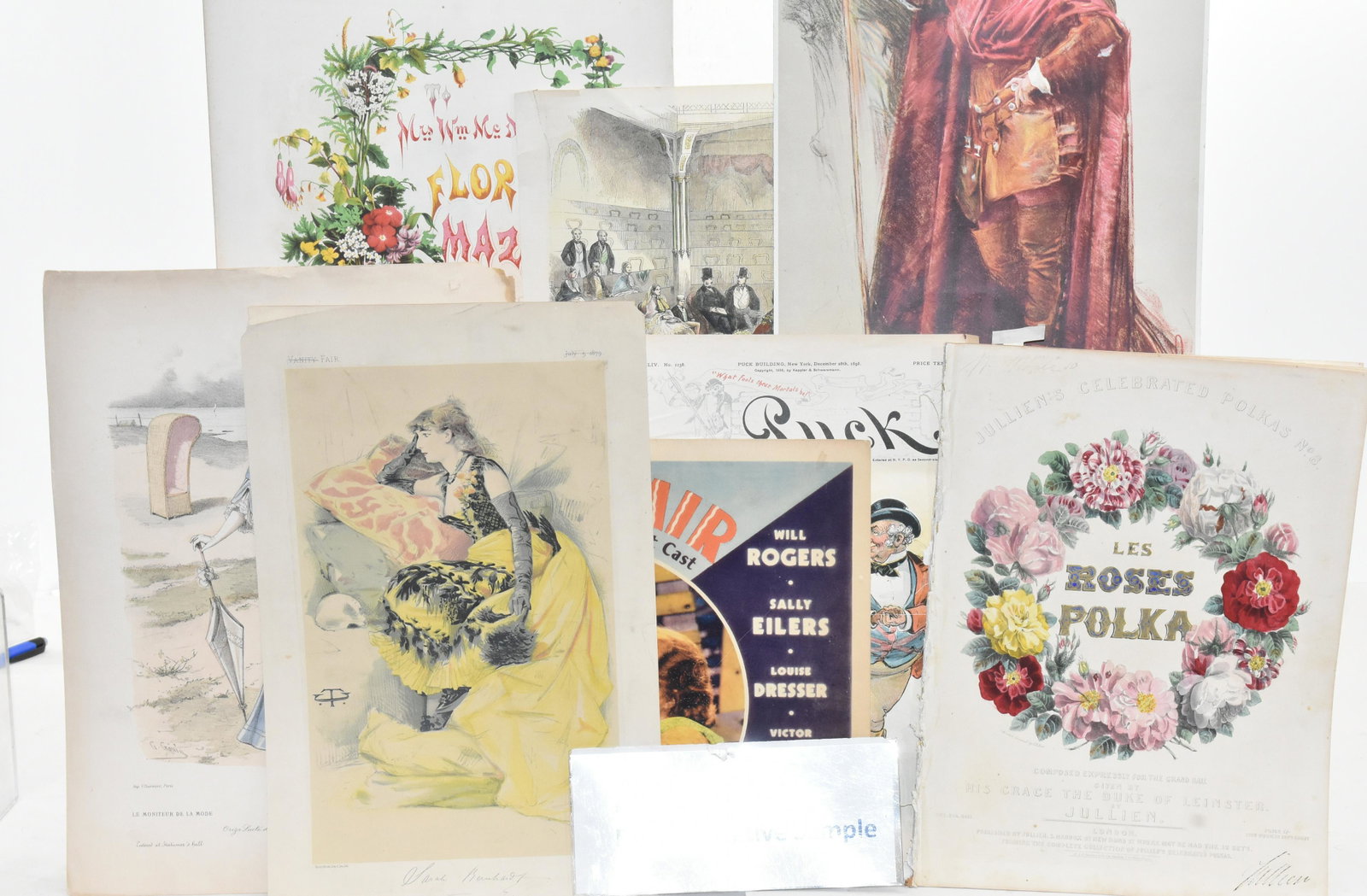 Grouping of 19th & 20th Century Art: 19th century sheet music with lithograph covers, various fashion prints, a Will Rodgers State Fair lobby card and mixed ephemera.