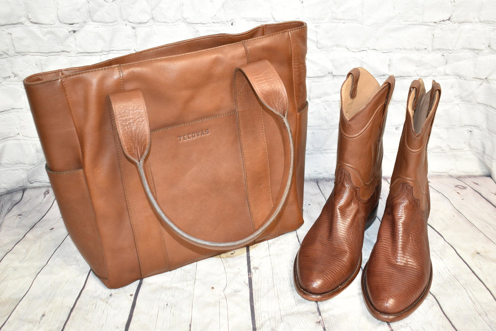 Pair of Tecovas Cowboy Boots NIB: Pair of Tecovas leather cowboy boots NIB, Boots are brown leather size 9EE. They have a leather carrying bag and come in original box.