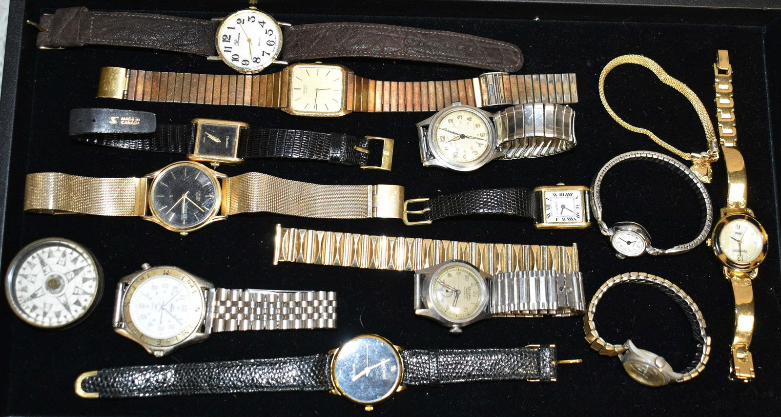 Grouping of Men's and Lady's Watches: Men's watches include Seiko, Wittnauer, Citizen and others. Lady's watches include two Cartiers marked "Swiss", Armitron, an Incabloc 17 jewel marked "Swiss" and others.