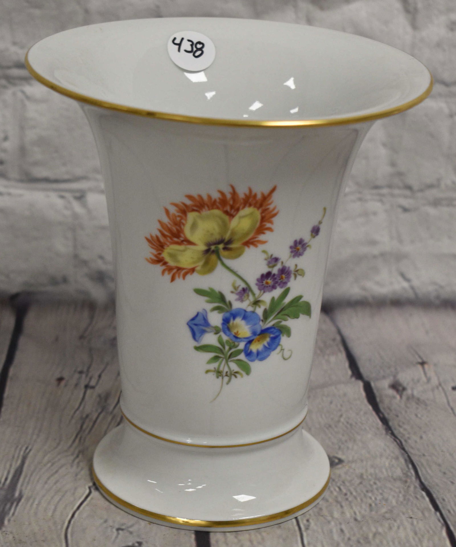 Meissen Hand Painted Floral Vase: Vase measures approx. 6 1/2"h. It is a hand painted floral vase with good gold flashing and a Meissen crossed sword mark on bottom.