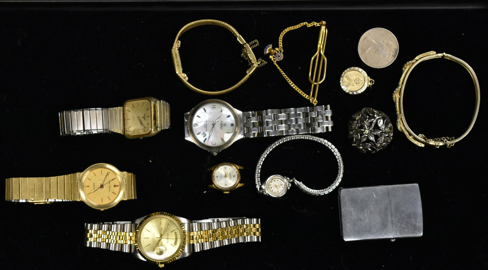 Vintage Watch Grouping: Including a men's Gruen with day and date, a men's Pierre Cardin, a men's Pulsar and a men's Figali with date. Lot also includes a lady's Andre Bouchard and two lady's Seiko watches.