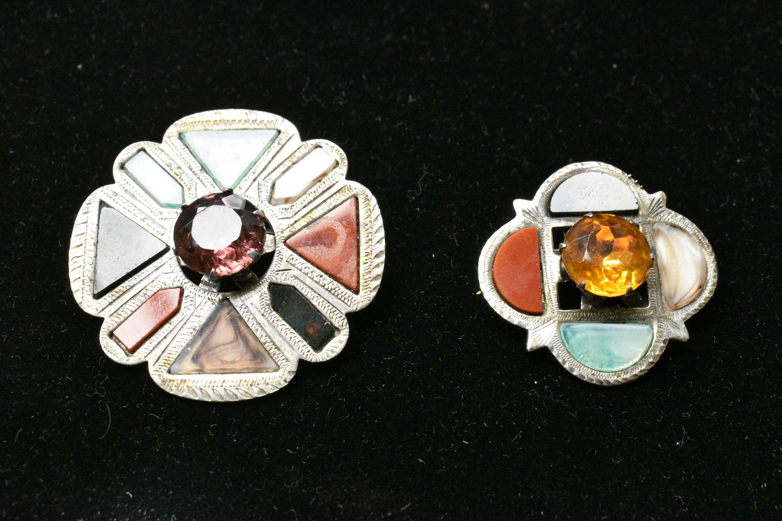 Antique Sterling Scottish Pins: includes one pin with an amethyst center stone and agates, the other cairnscrm and various agates, Scottish hallmarked.
