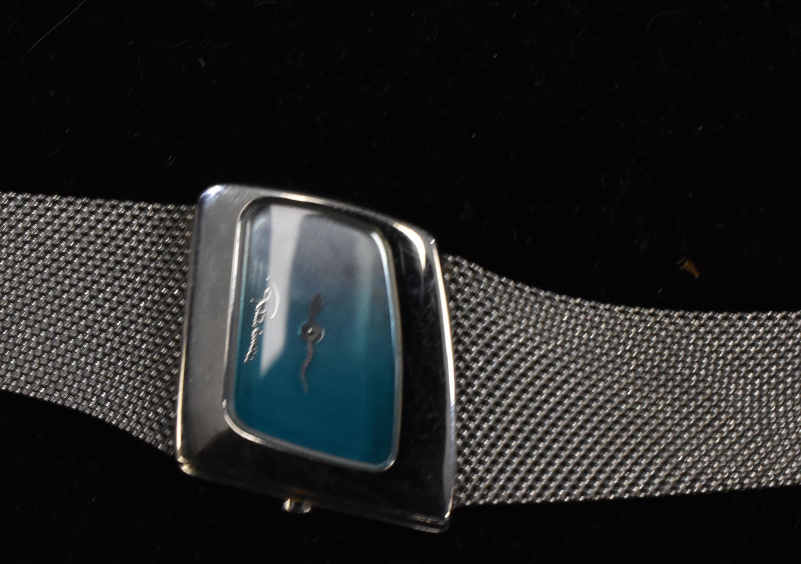 Roberto Cavalli Designer Watch: Water resistant watch made of stainless steel with a blue rectangular face.