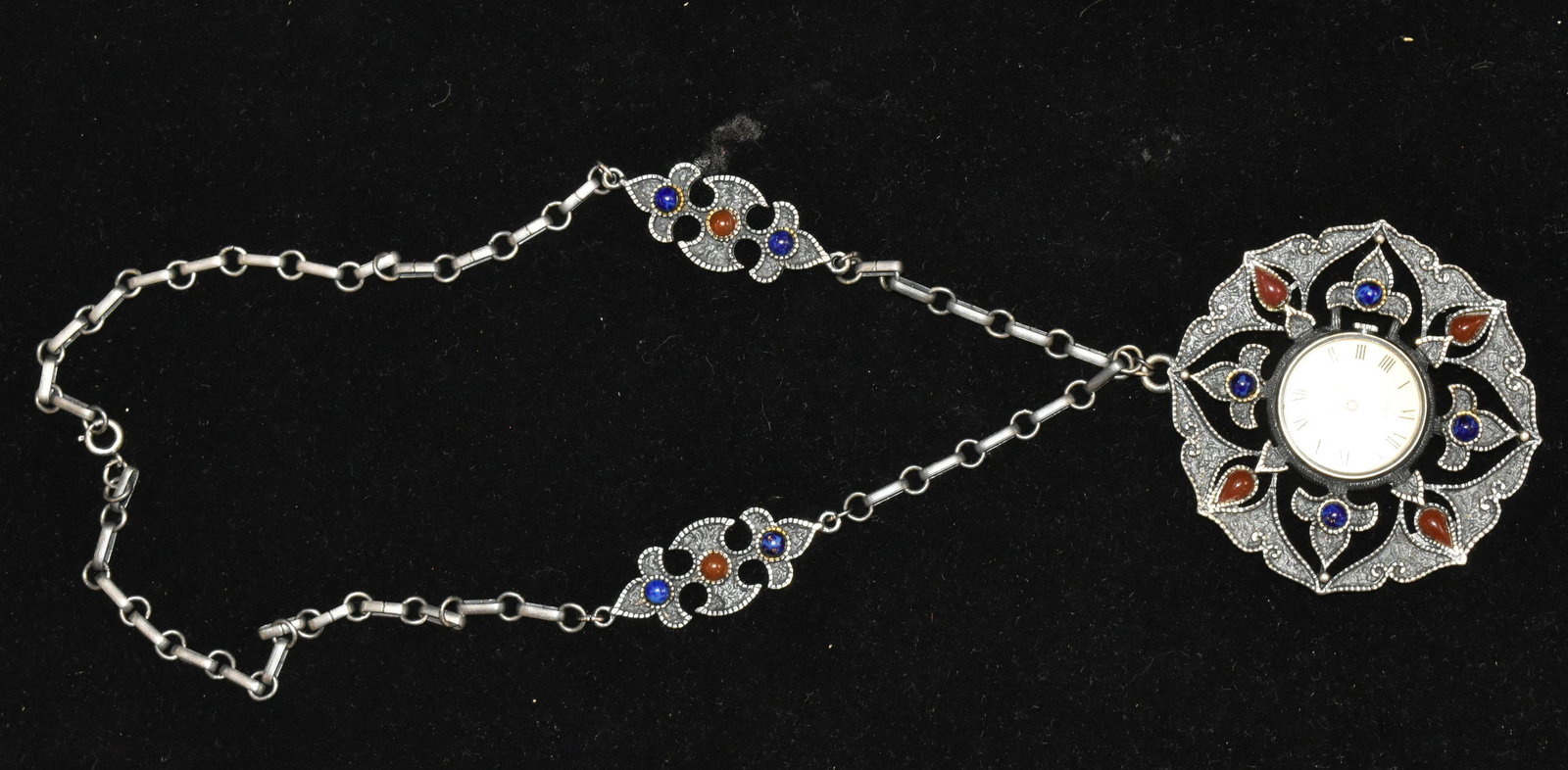 Large Coro Craft Pendant Watch: Seventeen jewel watch in a gemstone pendant with a matching chain. Item is circa 1960's. Watch is not working.