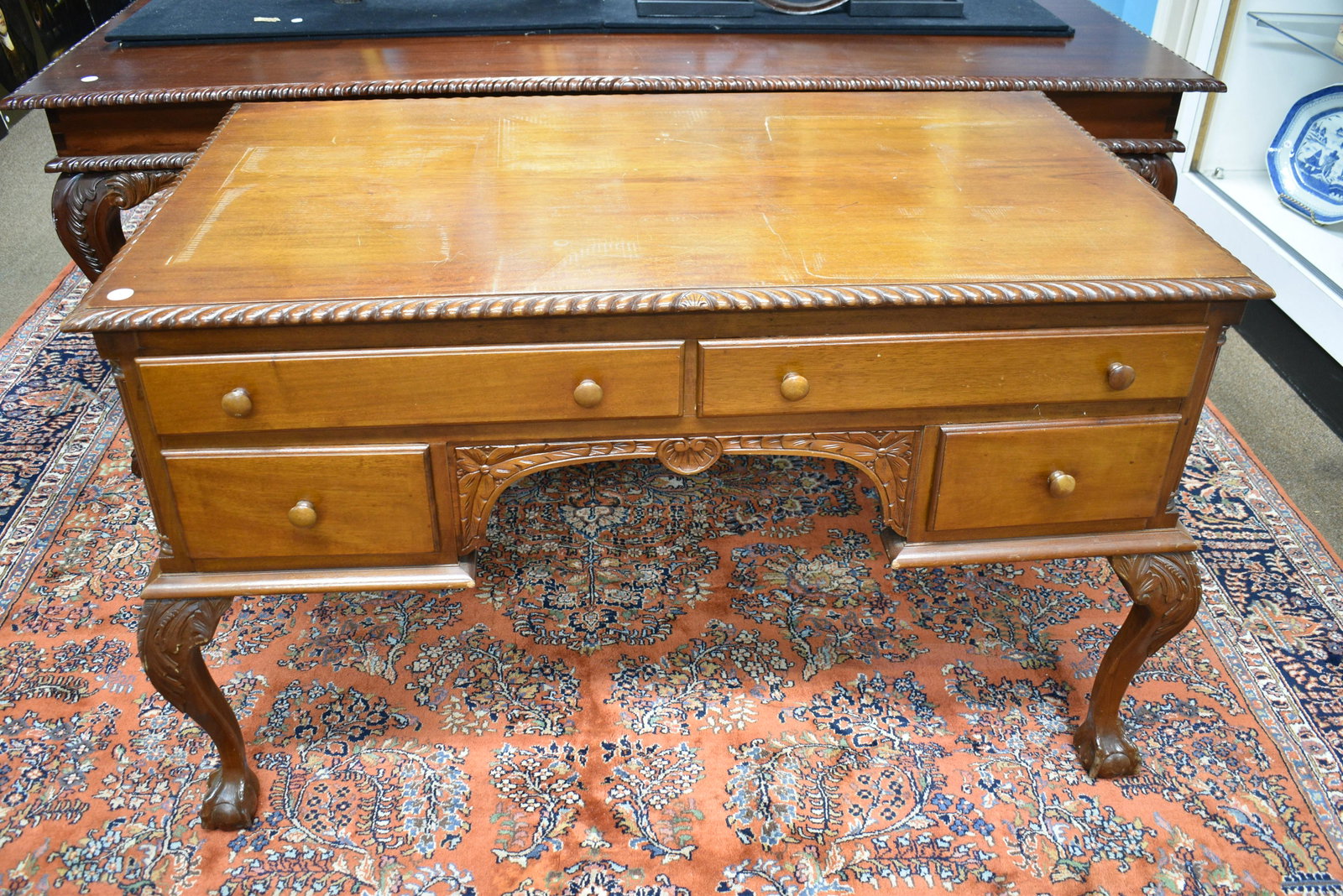 19thC Chippendale Style Partners Desk: Measures approx. 30"h x 50"w x 29"d. It has four hand dove tailed drawers on front and back, a refinished surface and stands on claw and ball Chippendale feet.