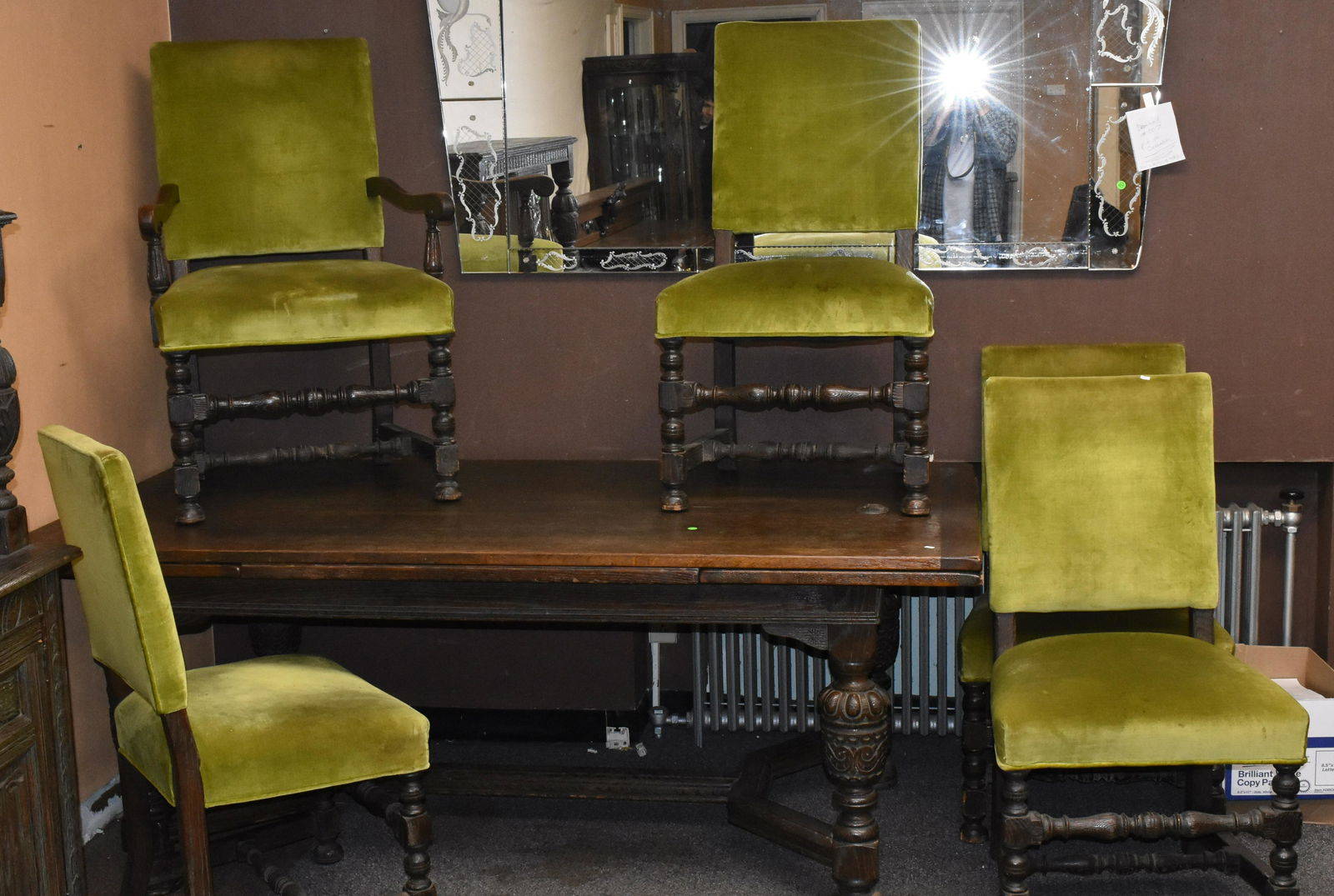 Gothic Revival Dining Table and Chairs: Table measures approx. 31"h x 78"w not including pull outs x 40"d. It is solid oak construction and has five matching chairs (one is arm chair) with green velvet upholstery (need cleaning).